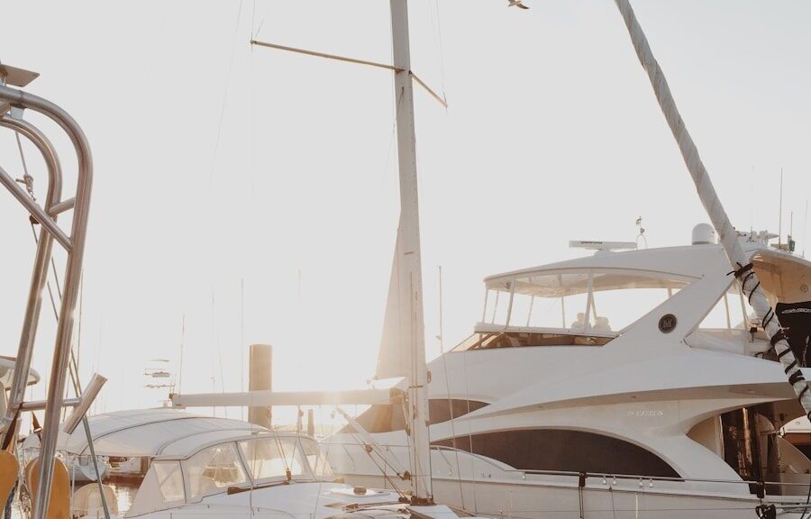 white yacht on dock during daytime